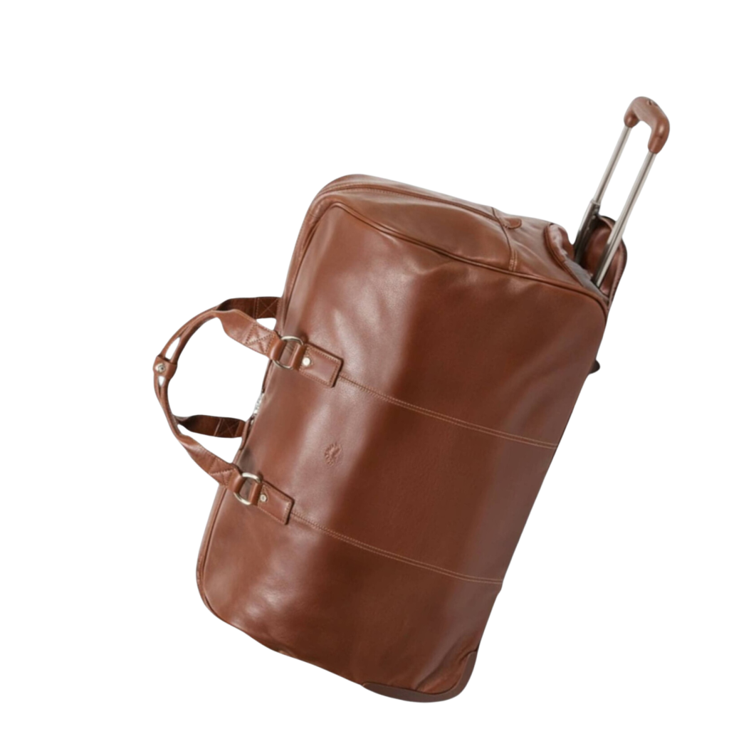Sac de voyage en cuir marron avec poignée télescopique.